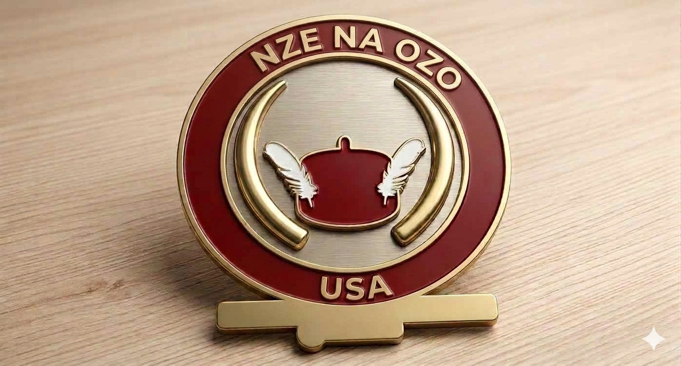 Traditional red Nze Na Ozo cap with feather